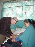 Martin and Elsa visiting a patient