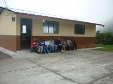 Volunteers of Ayuda Directa and local people posing for a souvenir photo