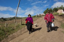 Jose and his wife return from milking cows