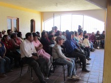 The audience watches carefully to the play